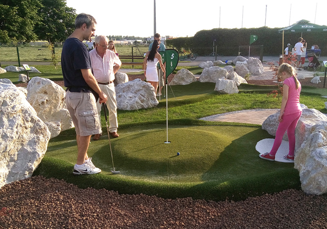 Playing adventure golf with a raised green